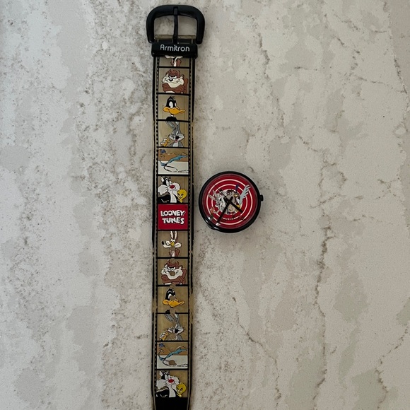 Armitron Vintage Looney Tunes Watch with Black and Clear Film Strip Band - Picture 1 of 6